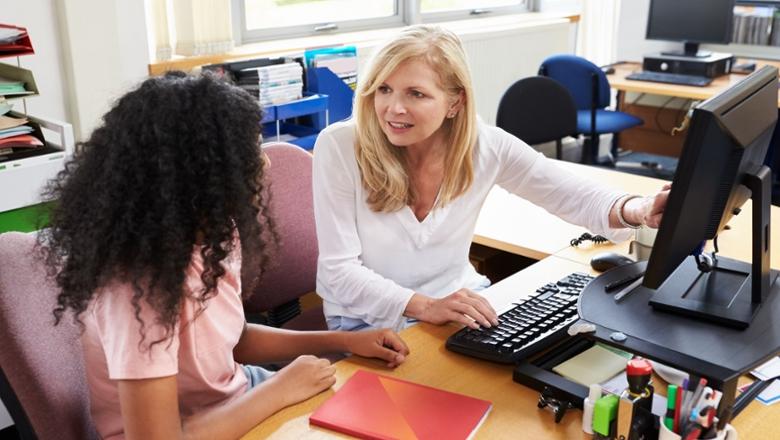 A college counselor talking to a student