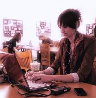 Student working on laptop in Leatherby Libraries